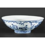 CHINESE MING STYLE BOWL, Xuande style, blue painted with maidens gardening and mountains in the