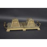 ART NOUVEAU INKSTAND a large brass inkstand with stylised Art Nouveau motifs, the two inkwells