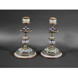 PAIR OF DOULTON LAMBETH CANDLESTICKS a pair of stoneware and brass candlesticks, and mounted on