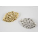 A PAIR OF DIAMOND AND GOLD BROOCHES each of openwork lattice design, mounted with circular-cut