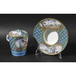 SEVRES CHOCOLATE CUP, COVER AND TREMBLEUSE SAUCER, date code x, the cup painted with a scene of