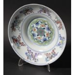 CHINESE OGEE SHAPED DOUCAI BOWL, the centre with a ring of flowers inside a green border, the