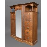 SHAPLAND & PETTER - ARTS & CRAFTS WARDROBE & DRESSING TABLE a large oak breakfront wardrobe,