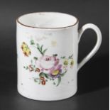 BRISTOL PORCELAIN TANKARD, circa 1770-80, painted with a rose spray and floral sprigs beneath a