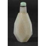 CHINESE PALE GREY JADE SNUFF BOTTLE, probably 19th century, pale of faceted teardrop form, with a