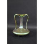 LARGE ZSOLNAY VASE a large twin handled Art Nouveau vase with a eosin iridescent glaze. Marked,