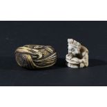 JAPANESE BONE NETSUKE, carved as a bird of prey, length 4.5cm; together with an ivory netsuke of a