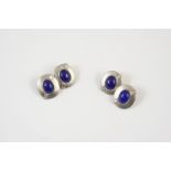 A PAIR OF LAPIS LAZULI AND DIAMOND CUFFLINKS each oval-shaped platinum link is set with an oval