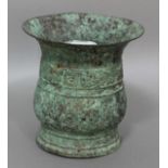 CHINESE ARCHAISTIC BRONZE VESSEL, Zhou style, of swollen baluster form with a band of scrolling