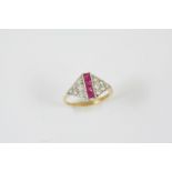 A RUBY AND DIAMOND RING the four square-shaped rubies are set with circular-cut diamonds to each