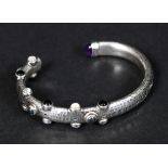 CONTEMPORARY SILVER BANGLE - STUART JENKINS a sterling silver hand beaten bangle or wrist torque,