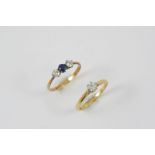 A DIAMOND SOLITAIRE RING the circular-cut diamond is set in 18ct yellow gold and platinum, size O
