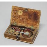 BOXED TRAVELLING SET OF MIDDLE EASTERN BRASS SCALES AND WEIGHTS, with steel mounts and tweezers, box