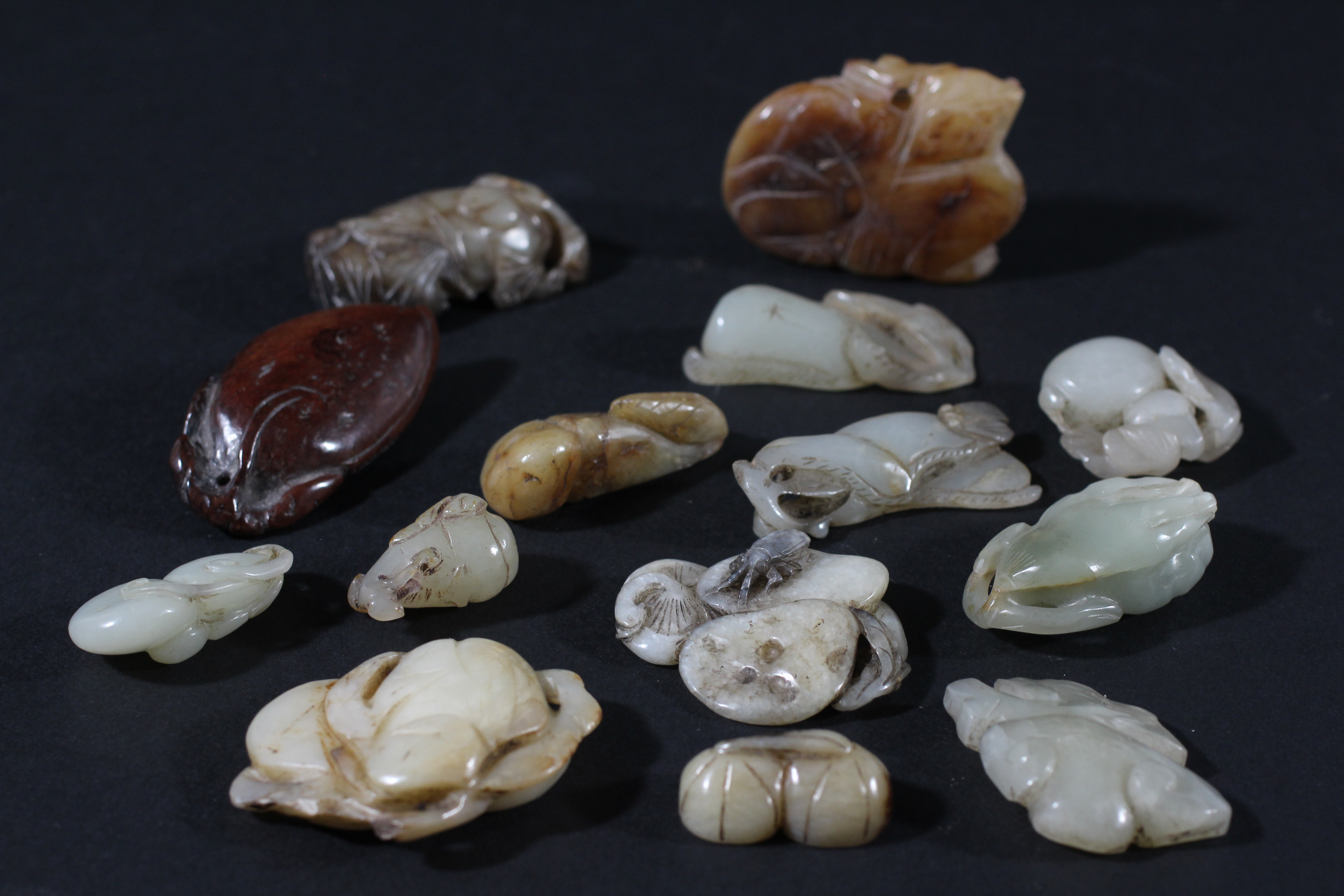 COLLECTION OF CHINESE PENDANTS, jade and other stones, depicting gourds, ruyi, finger citron and