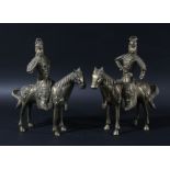 PAIR OF CHINESE BRASS MONGOL STYLE WARRIORS ON HORSEBACK, set with cabochon coloured stones,