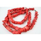 THREE LARGE CORAL NECKLACES formed with irregular-shaped sections of coral