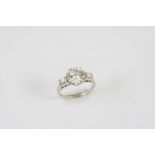 A DIAMOND SOLITAIRE RING the round brilliant-cut diamond weighs 2.80 carats and is set with a