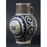 GERMAN WESTERWALD STONEWARE JUG, 17th or 18th century, sgrafitto foliate decoration on blue and