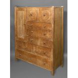 HEAL'S LIMED OAK CUPBOARD a large oak cupboard with a large single door cupboard and smaller