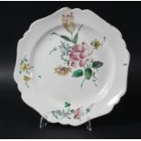 FRENCH FAIENCE PLATE, mid 18th century, Marseille, painted with a tulip, rose and other flowers,