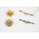 A VICTORIAN GOLD AND PEARL SET SUNBURST BROOCH set overall with graduated half pearls in 15ct