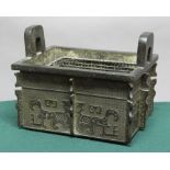 CHINESE BRONZE ARCHAISTIC CENSER, fang ding, of rectangular, two handled form, decorated with