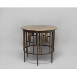 ART NOUVEAU OCCASIONAL TABLE probably Scottish, the circular mahogany table with vertical supports