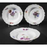 SIX MEISSEN MARCOLINI SOUP BOWLS, circa 1800, painted with various floral sprays inside a shaped