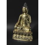 CHINESE OR SOUTH EAST ASIAN SHAKYAMUNI BUDDHA, seated cross legged on a double lotus base, six