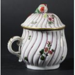 COZZI CHOCOLATE CUP AND COVER, late 18th century, of wrythen form painted with floral sprays, iron