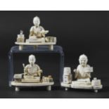 GROUP OF THREE JAPANESE IVORY OKIMONO, circa 1900, each modelled as a man at work, including one