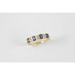 A SAPPHIRE AND DIAMOND RING set with oval-shaped sapphires and circular-cut diamonds, in gold.