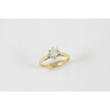 A DIAMOND SOLITAIRE RING the brilliant-cut diamond weighs approximately 0.65 carats and is set in