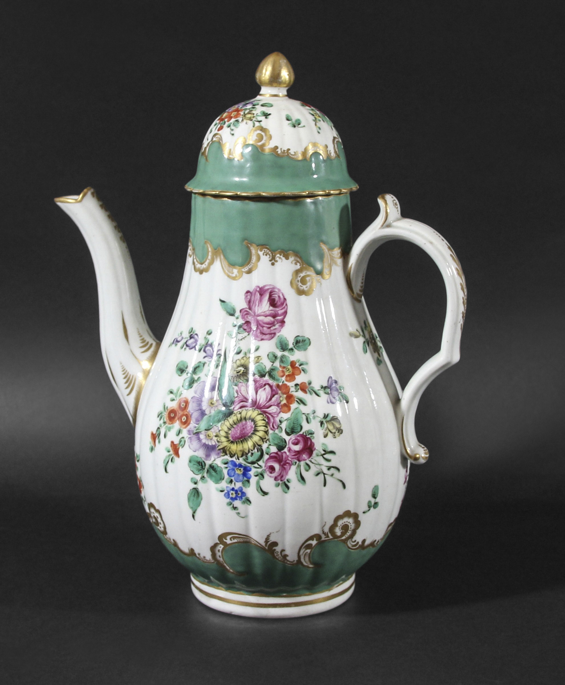 WORCESTER COFFEE POT AND COVER, circa 1760-70, the moulded body painted with floral sprays between