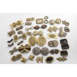 A QUANTITY OF GILT METAL / BRASS BUCKLES of mixed designs and dates, 19th and 20th century; the