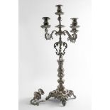 A PAIR OF 19TH CENTURY FIVE-LIGHT CANDELABRA with cast lion mask & scroll branches, the embossed