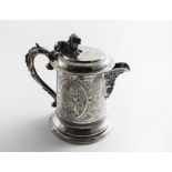 INDIAN INTEREST:- A Victorian engraved flagon with a cylindrical body, domed & spreading foot & a