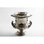 A PAIR OF LATE MIDDLE PERIOD OLD SHEFFIELD PLATED WINE COOLERS of campana form with embossed