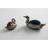 AN EDWARDIAN SILVER NOVELTY PIN CUSHION in the form of a swimming duck, by Levi & Salaman,