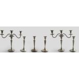 A LATE 20TH CENTURY SUITE OF FOUR CANDLESTICKS and a pair of three-light candelabra in the style