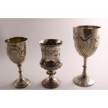 A LATE VICTORIAN LARGE SILVER GOBLET with embossed wrythen fluting by J & W. Deakin, Sheffield