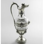 A LATE 19TH CENTURY FRENCH MOUNTED CUT-GLASS CLARET JUG of classical vase form with pierced and