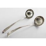 A GEORGE III IRISH BRIGHT-CUT SOUP LADLE with a tied ribbon on the terminal, crested, maker's mark