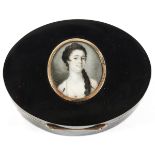 A GEORGE III TORTOISESHELL SNUFF BOX oval, gold mounted, the top set with a miniature portrait of