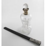 A LATE VICTORIAN MOUNTED CLEAR CGLASS DECANTER & STOPPER with a waisted body and four pouring