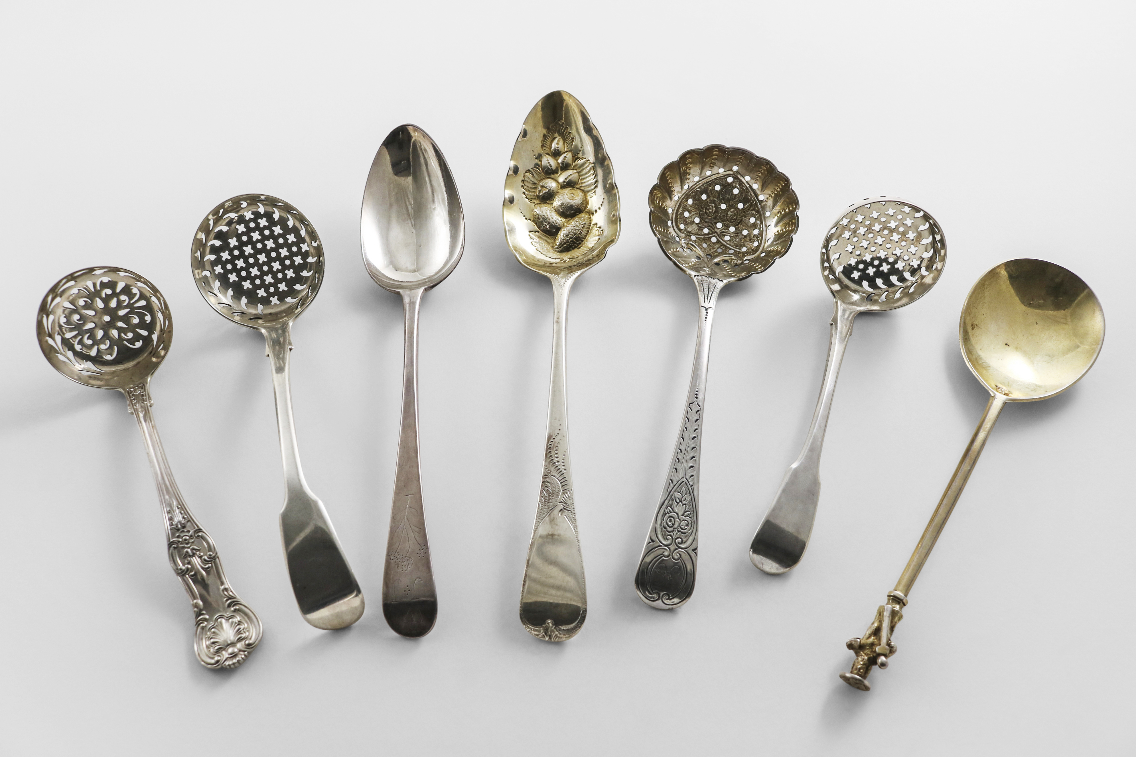 A VICTORIAN SILVER QUEEN'S PATTERN SUGAR SIFTER LADLE by Francis Higgins, London 1860, a silver