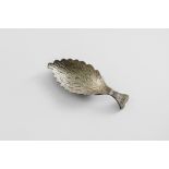 A GEORGE III CADDY SPOON The leaf-shaped bowl stamped with overlapping feather plumage, with a