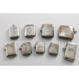 NINE LATE VICTORIAN, EDWARDIAN & LATER SILVER VESTA CASES OF MIXED DESIGNS Some with initials /