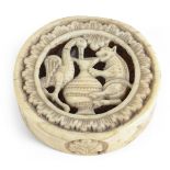 A MEDIEVAL WALRUS IVORY DRAUGHTSMAN carved to illustrate Aesop's fable of the Fox and the Stork