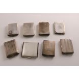EIGHT VARIOUS SILVER ART DECO BOOK MATCH HOLDERS (some with initials, one inscribed inside "Don't